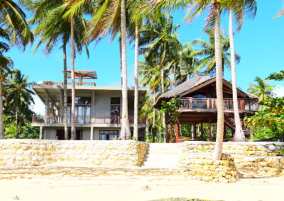 Front view of the main house, Kubo and seawall from the beach