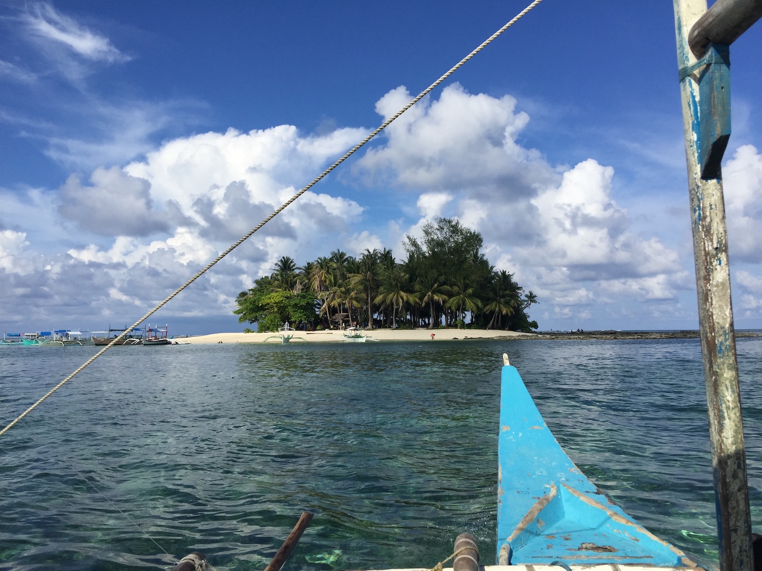 Image of a boat on the way to Guyam Island